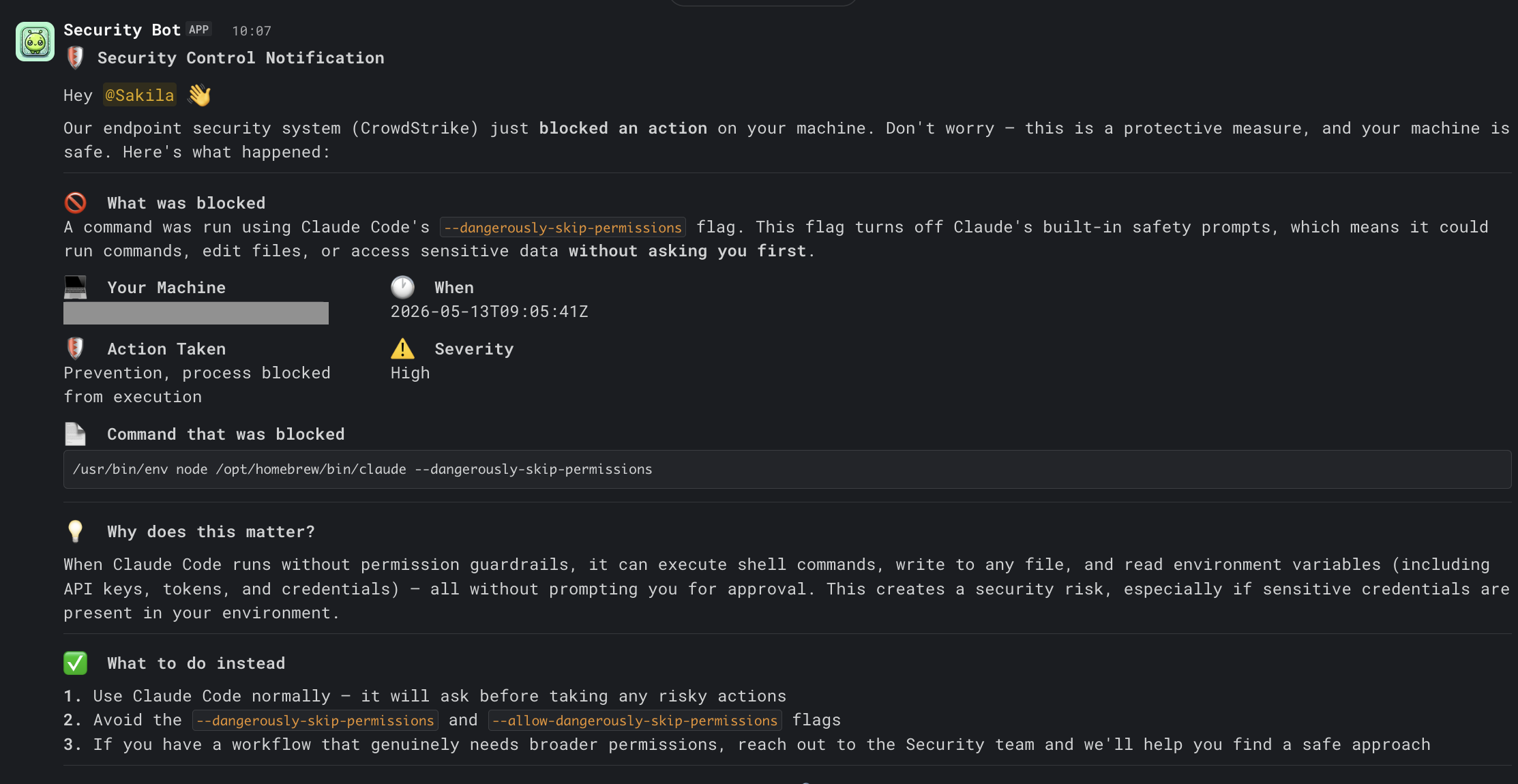 Slack DM sent to the user: header &ldquo;Security Control Notification&rdquo;, explanation of what was blocked, machine + timestamp + action + severity + the blocked command, then a &ldquo;Why does this matter?&rdquo; section and a numbered list of safer alternatives